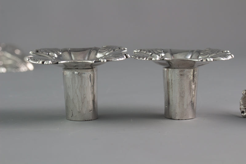 An Exceptional Set of Four Cast Silver Candlesticks London 1764/5