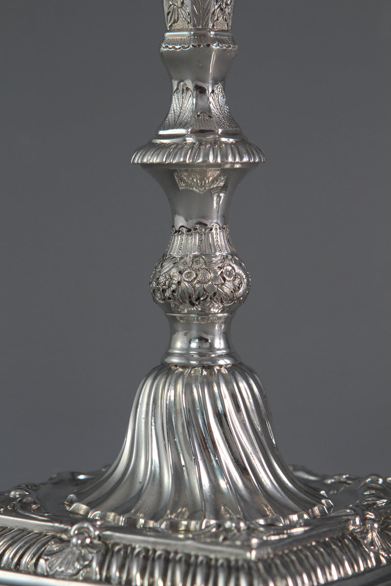 A Pair of Cast Silver Candlesticks by William Cafe London 1760