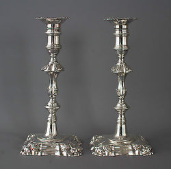 A Superb Pair of George II Cast Silver Candlesticks by John Cafe London 1754