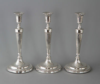 A Fine Set of Three Georgian Silver Candlesticks Sheffield 1781 and 1789