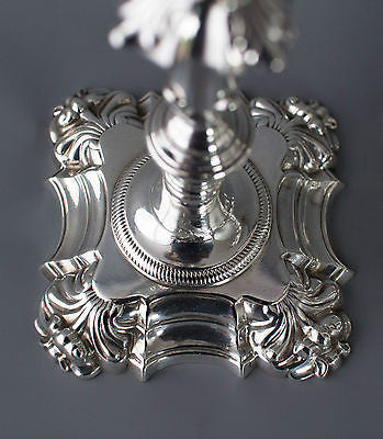 A Superb Pair of George II Cast Silver Candlesticks by John Cafe London 1754