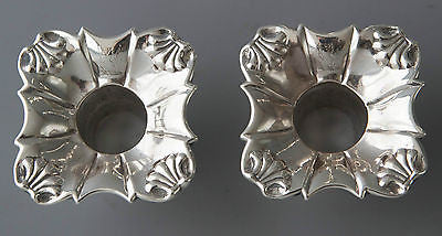 A Superb Pair of Georgian Cast Silver Candlesticks by William Cafe London 1763.