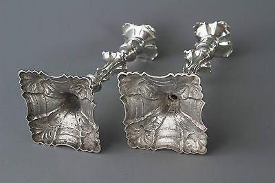A Superb Pair of Georgian Cast Silver Candlesticks by William Cafe London 1763.