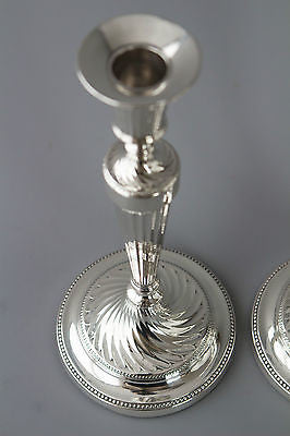 A Fine Set of Three Georgian Silver Candlesticks Sheffield 1781 and 1789