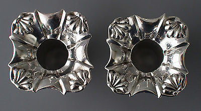 A Superb Pair of George II Cast Silver Candlesticks by John Cafe London 1754