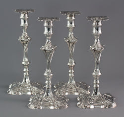 An Exceptional Set of Four Cast Silver Candlesticks London 1764/5