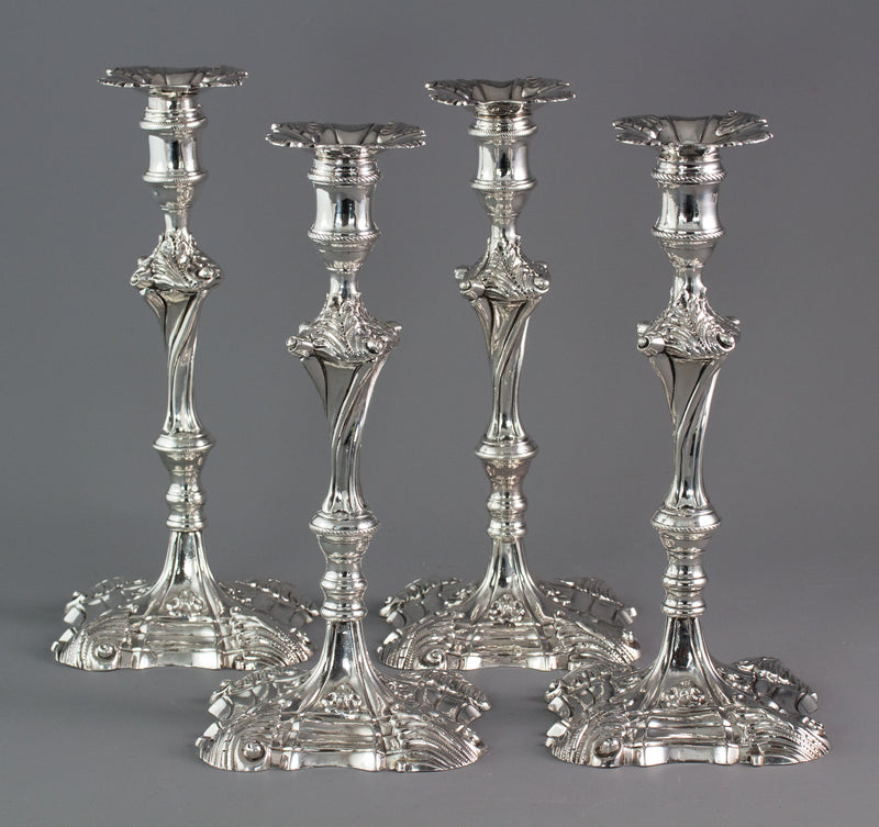 An Exceptional Set of Four Cast Silver Candlesticks London 1764/5