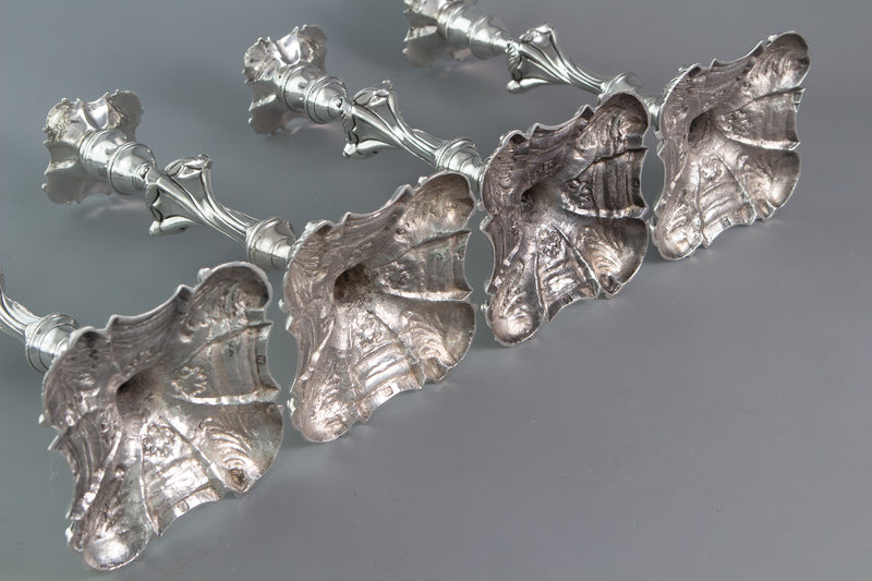 An Exceptional Set of Four Cast Silver Candlesticks London 1764/5