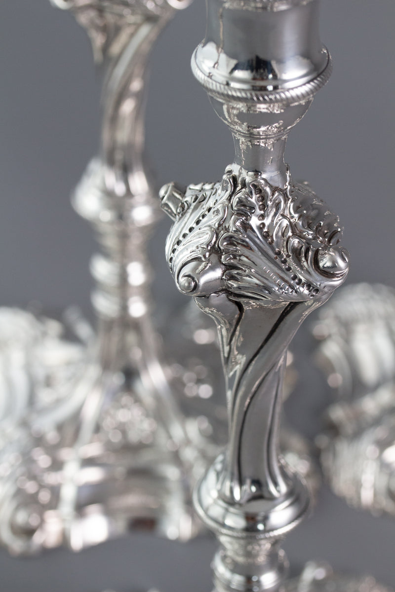 An Exceptional Set of Four Cast Silver Candlesticks London 1764/5
