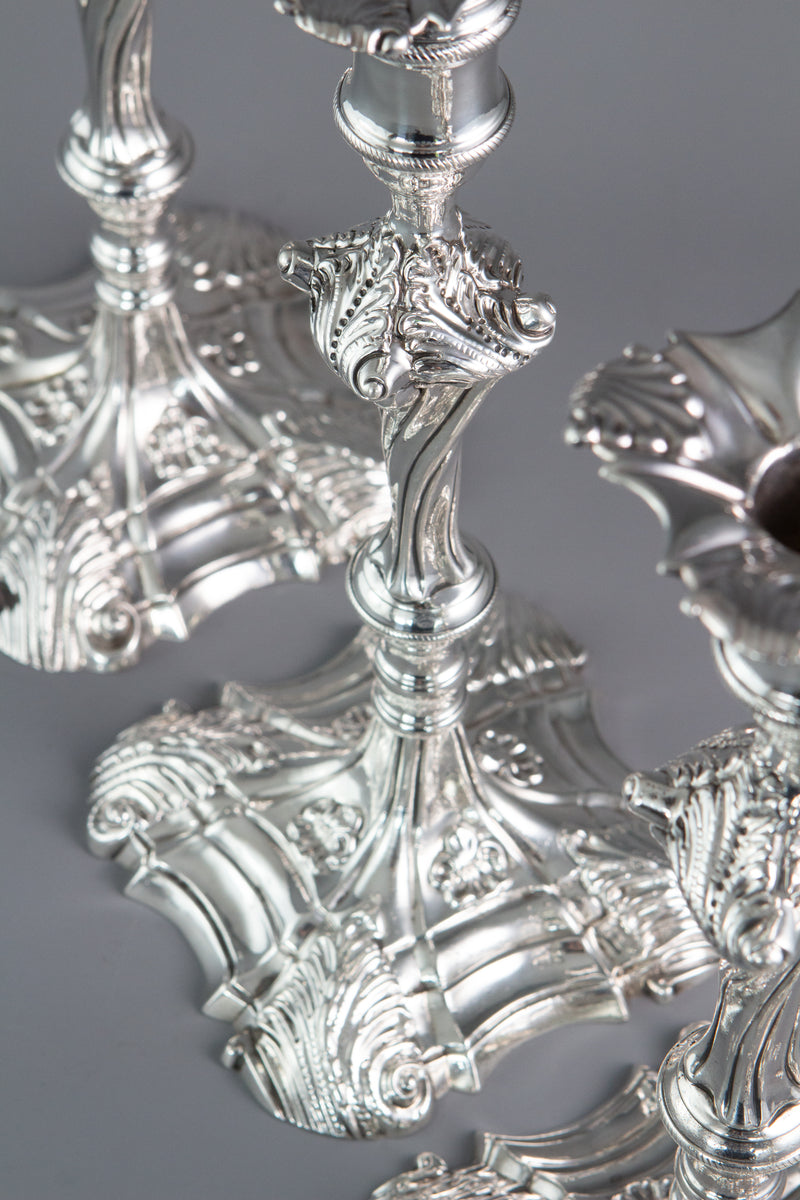 An Exceptional Set of Four Cast Silver Candlesticks London 1764/5