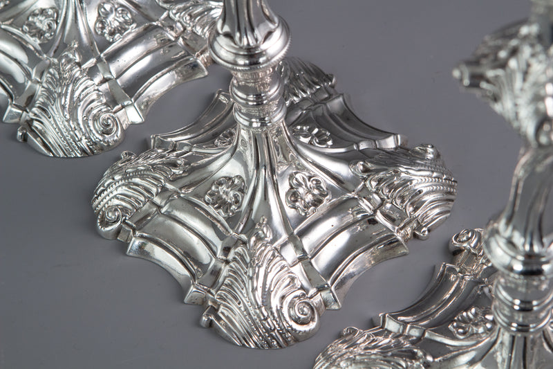 An Exceptional Set of Four Cast Silver Candlesticks London 1764/5