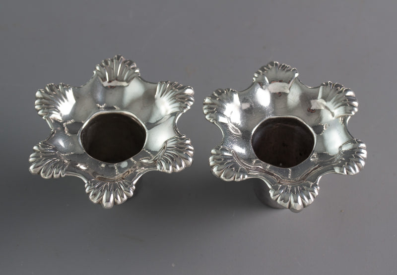 A Pair of George III Cast Silver Candlesticks, London 1763 by William Cafe