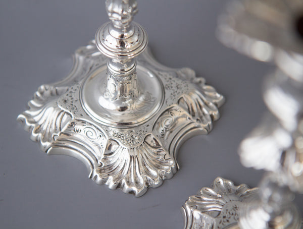 A superb pair of Cast George II Silver Candlesticks by John Cafe 1749