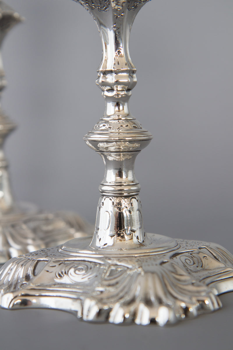 A superb pair of Cast George II Silver Candlesticks by John Cafe 1749