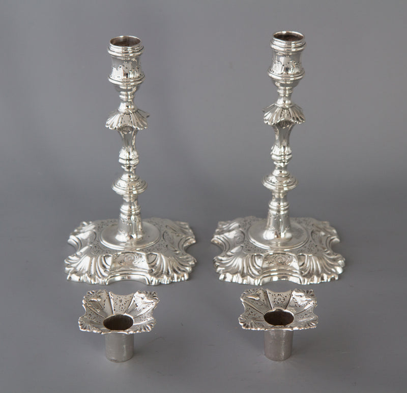 A superb pair of Cast George II Silver Candlesticks by John Cafe 1749