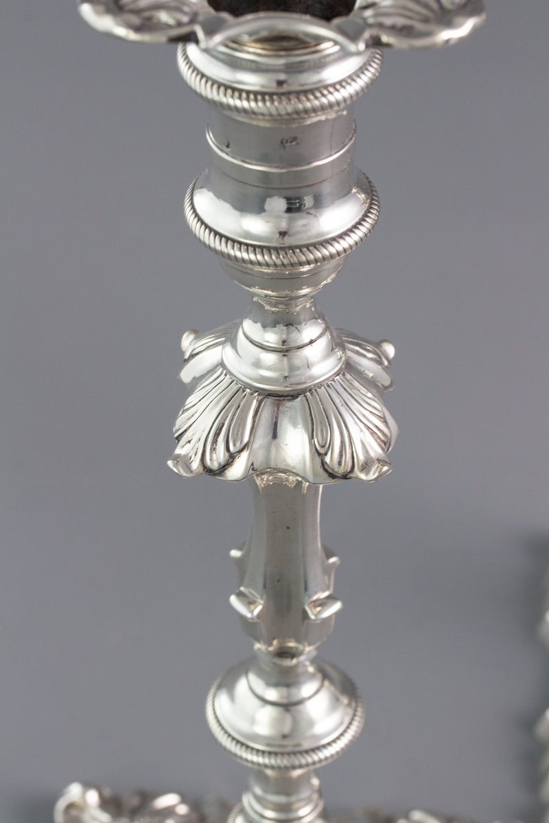 A Superb pair of George III Cast Silver Candlesticks by Ebenezer Coker, London 1764