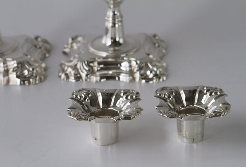 A Superb Pair of George II Cast Silver Candlesticks by John Cafe London 1754