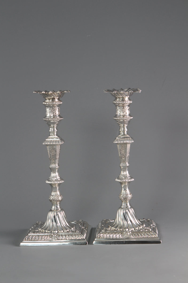 A Pair of Cast Silver Candlesticks by William Cafe London 1760