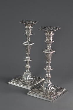 A Pair of Cast Silver Candlesticks by William Cafe London 1760
