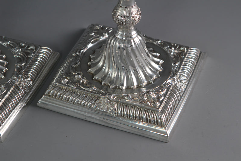 A Pair of Cast Silver Candlesticks by William Cafe London 1760