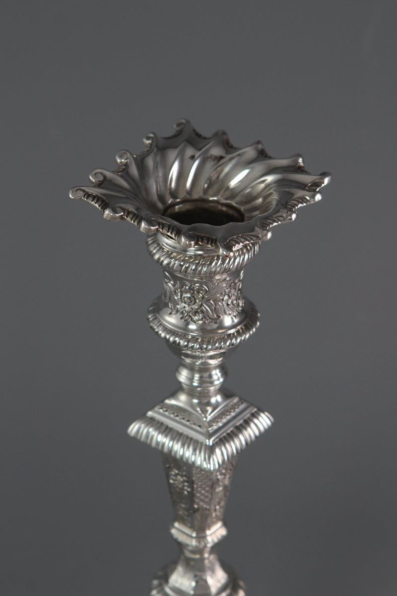 A Pair of Cast Silver Candlesticks by William Cafe London 1760