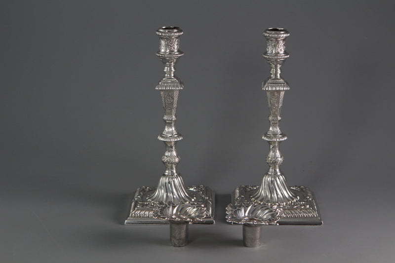 A Pair of Cast Silver Candlesticks by William Cafe London 1760