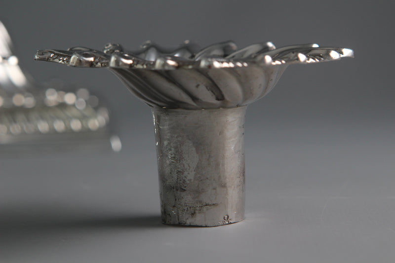A Pair of Cast Silver Candlesticks by William Cafe London 1760