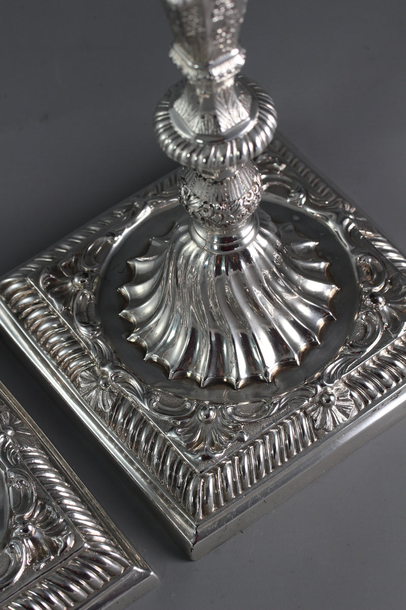 A Pair of Cast Silver Candlesticks by William Cafe London 1760