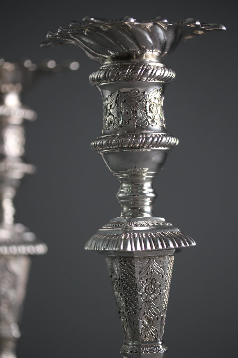 A Pair of Cast Silver Candlesticks by William Cafe London 1760