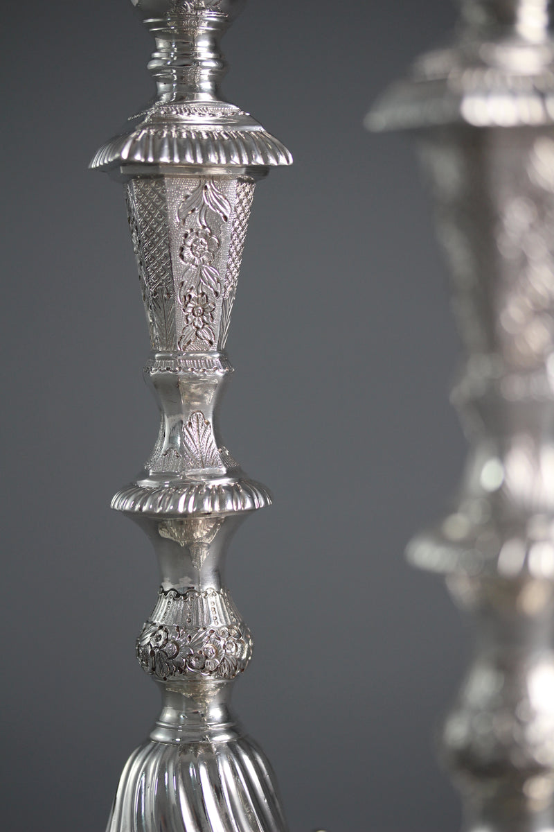 A Pair of Cast Silver Candlesticks by William Cafe London 1760