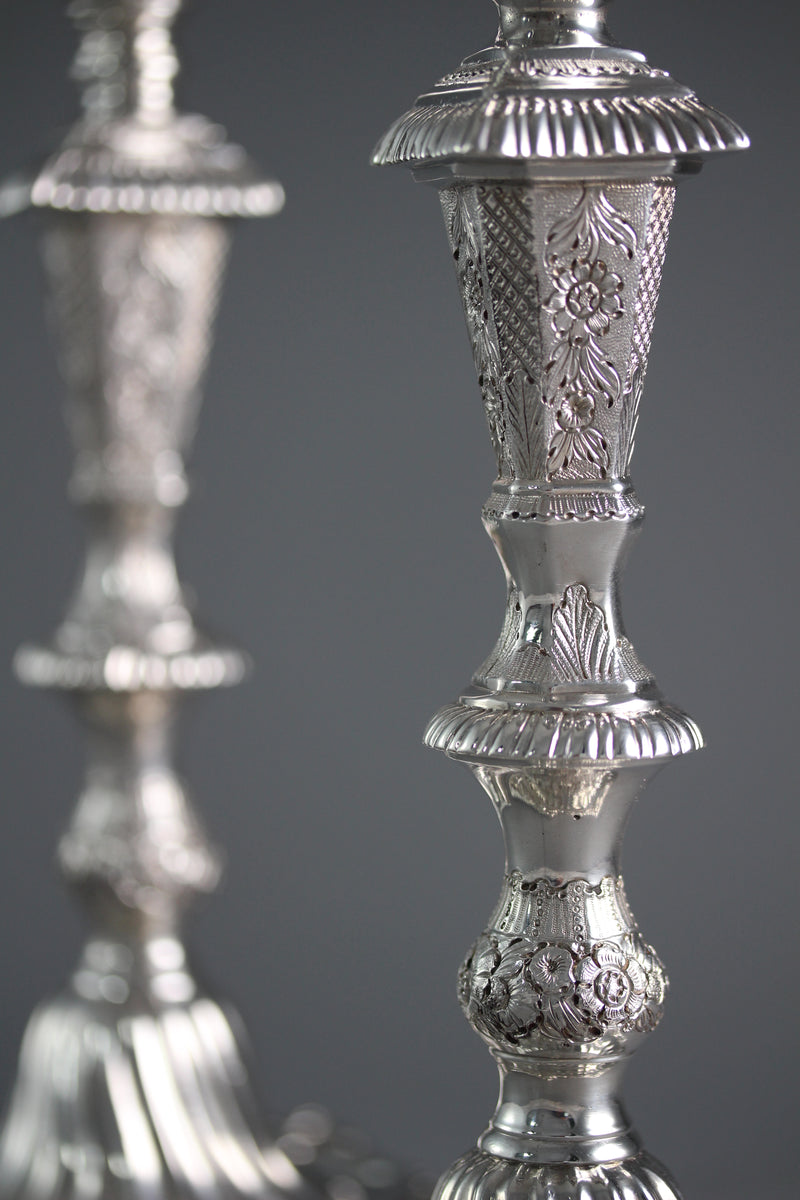 A Pair of Cast Silver Candlesticks by William Cafe London 1760