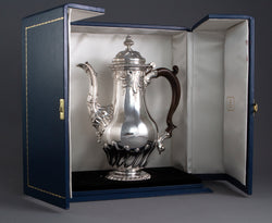 A Huguenot George II silver coffee pot, by Samuel Courtauld I, London 1757