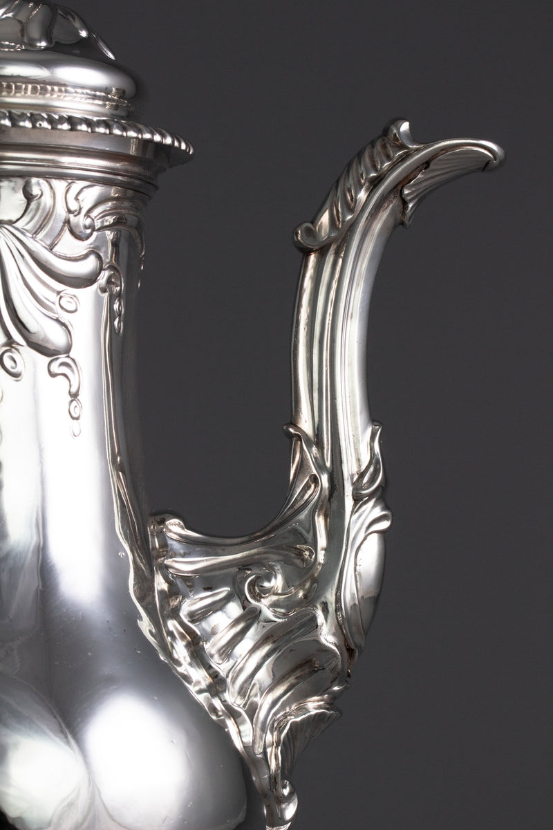 A Huguenot George II silver coffee pot, by Samuel Courtauld I, London 1757