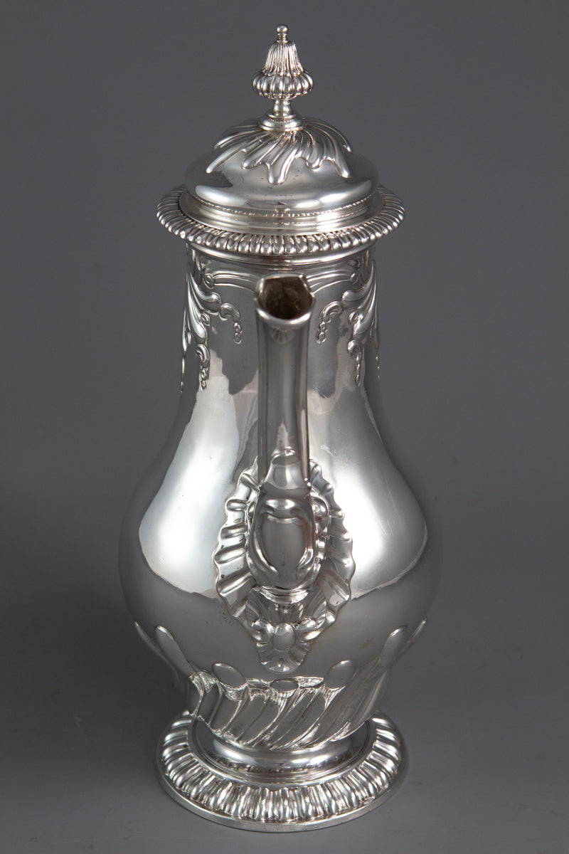 A Huguenot George II silver coffee pot, by Samuel Courtauld I, London 1757