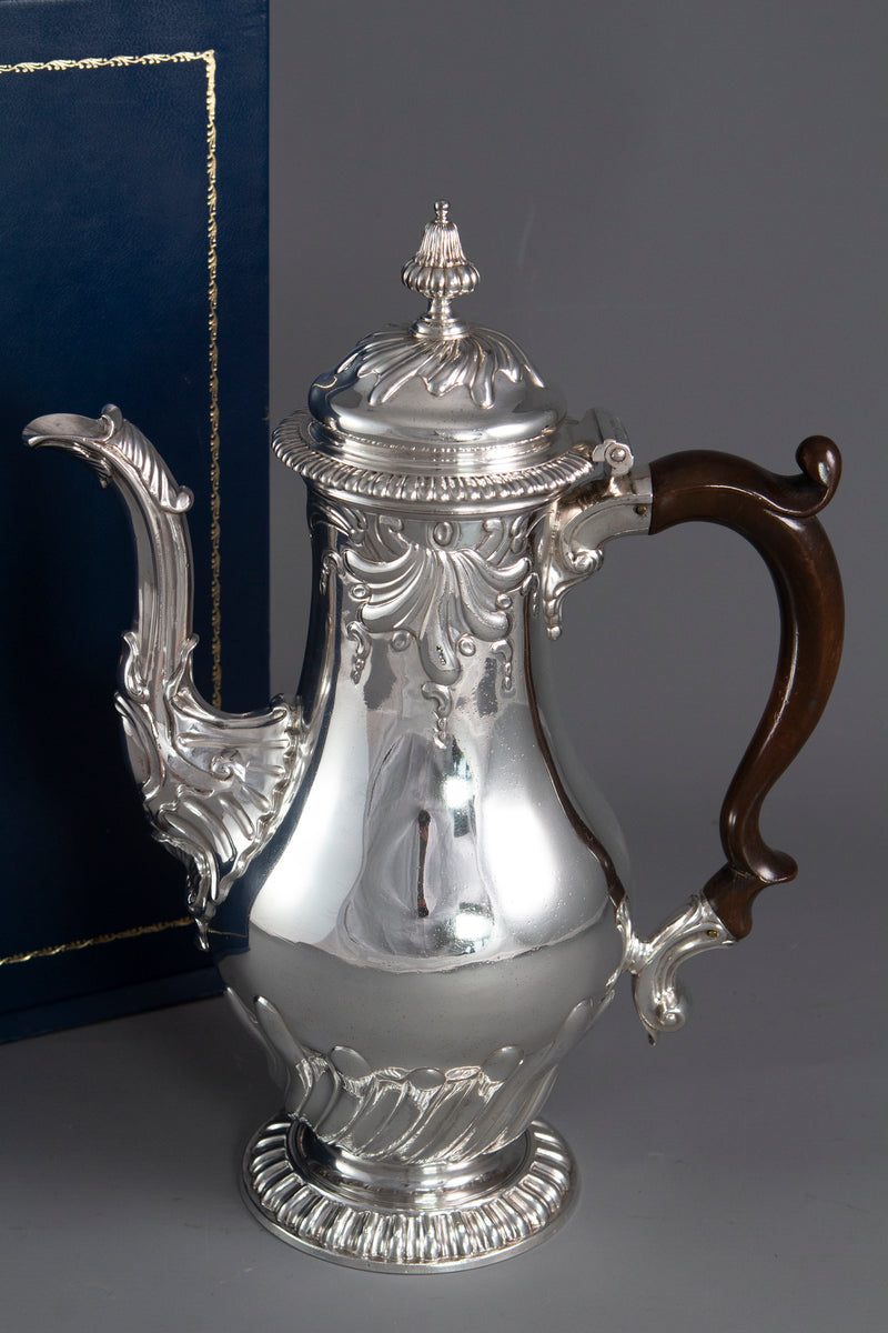 A Huguenot George II silver coffee pot, by Samuel Courtauld I, London 1757