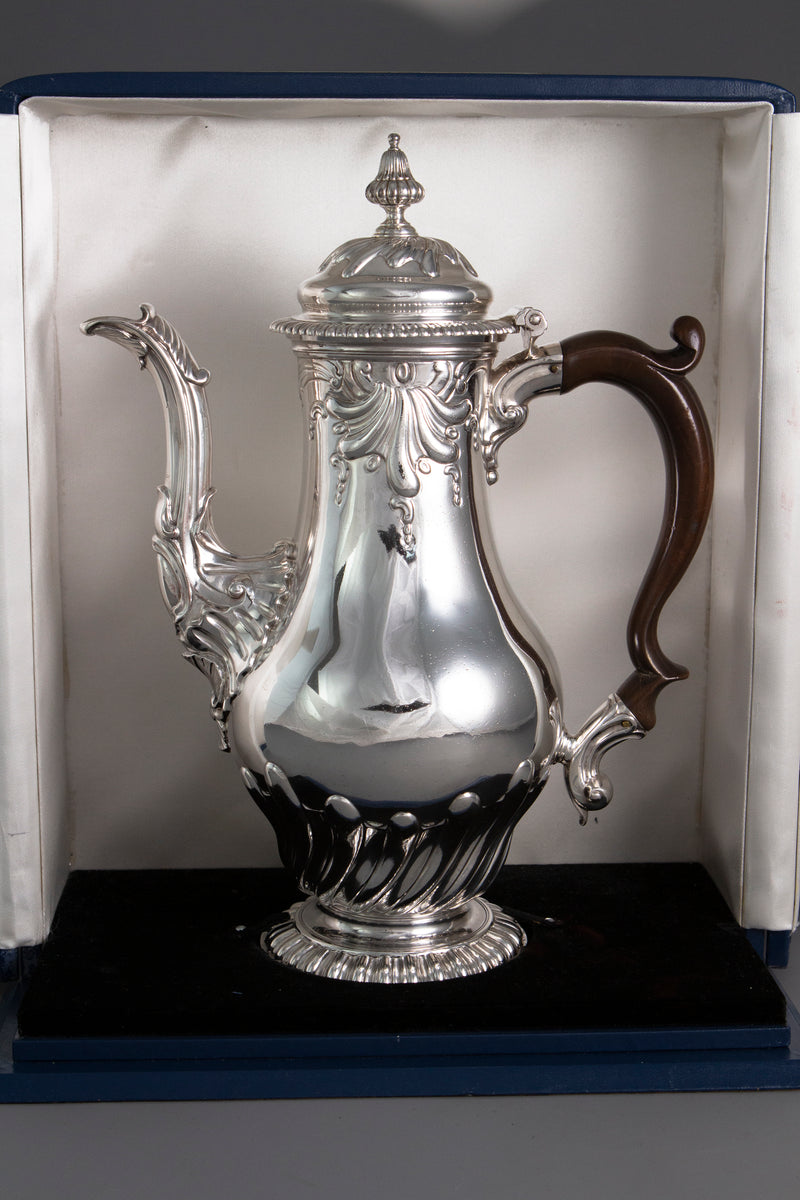 A Huguenot George II silver coffee pot, by Samuel Courtauld I, London 1757