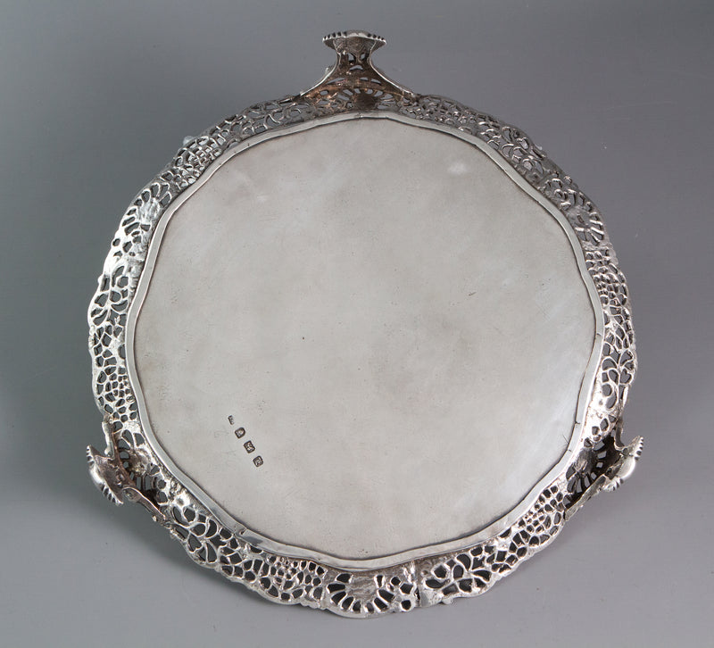An early George III shaped circular salver with a cast gallery, Walter Tweedie, London, 1766