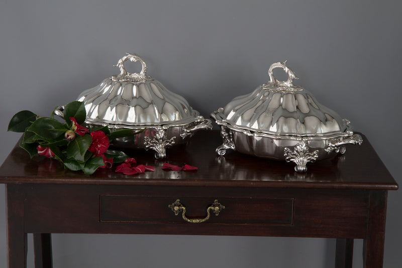 An Outstanding Pair of Silver Vegetable Tureens or Entree Dishes with Silver-Plated Warming Stands, by Joseph Angell & Son, London 1845