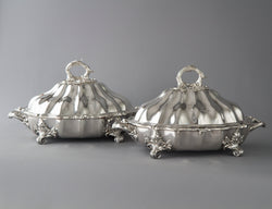 An Outstanding Pair of Silver Vegetable Tureens or Entree Dishes with Silver-Plated Warming Stands, by Joseph Angell & Son, London 1845