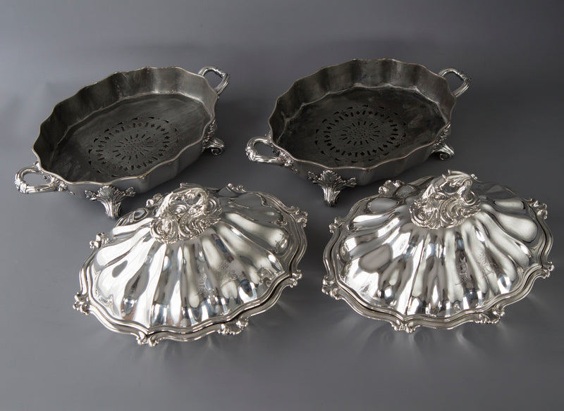 An Outstanding Pair of Silver Vegetable Tureens or Entree Dishes with Silver-Plated Warming Stands, by Joseph Angell & Son, London 1845