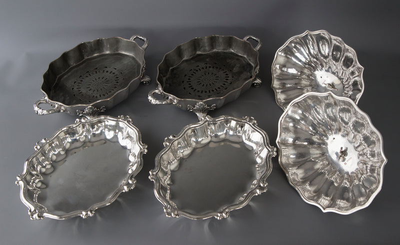 An Outstanding Pair of Silver Vegetable Tureens or Entree Dishes with Silver-Plated Warming Stands, by Joseph Angell & Son, London 1845