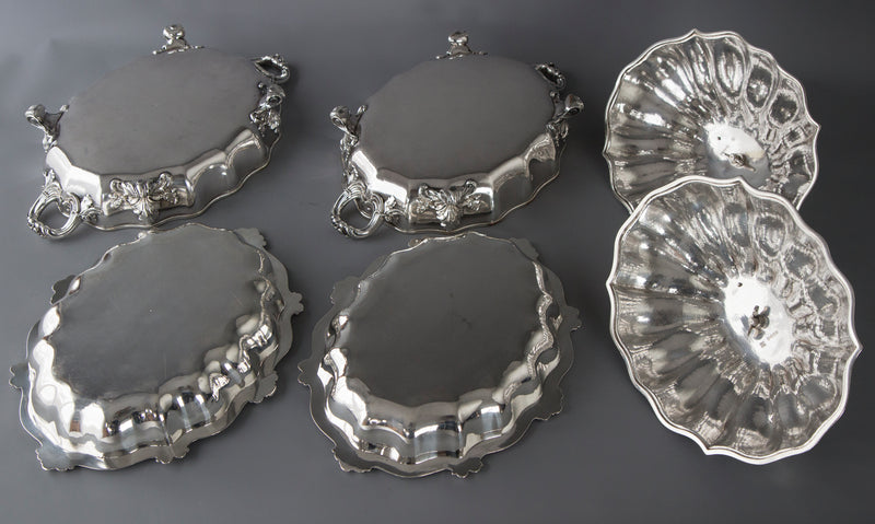 An Outstanding Pair of Silver Vegetable Tureens or Entree Dishes with Silver-Plated Warming Stands, by Joseph Angell & Son, London 1845