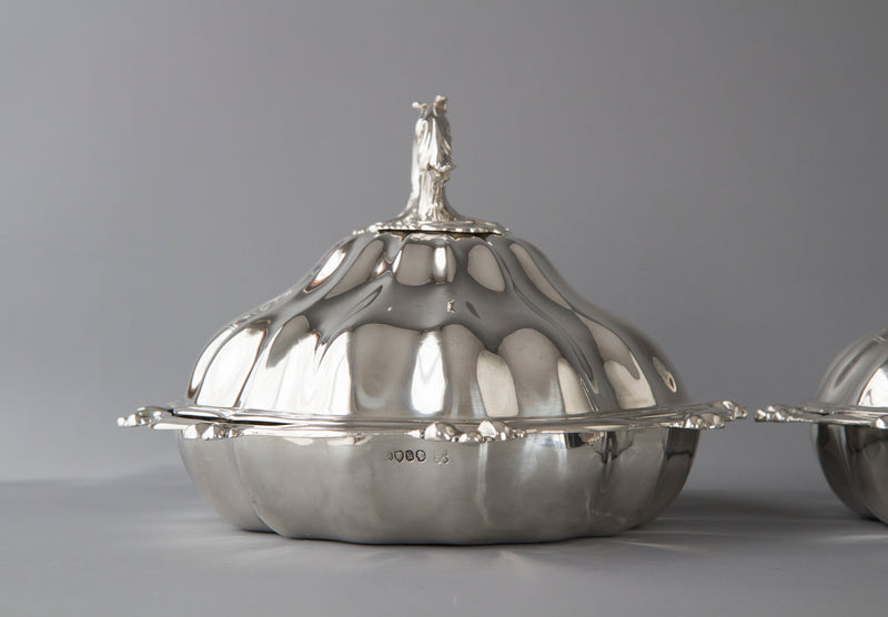 An Outstanding Pair of Silver Vegetable Tureens or Entree Dishes with Silver-Plated Warming Stands, by Joseph Angell & Son, London 1845