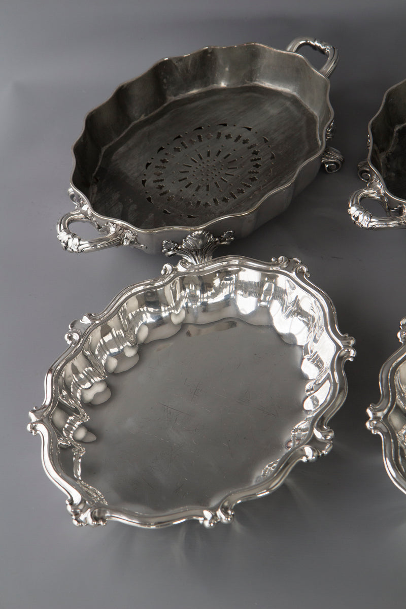 An Outstanding Pair of Silver Vegetable Tureens or Entree Dishes with Silver-Plated Warming Stands, by Joseph Angell & Son, London 1845