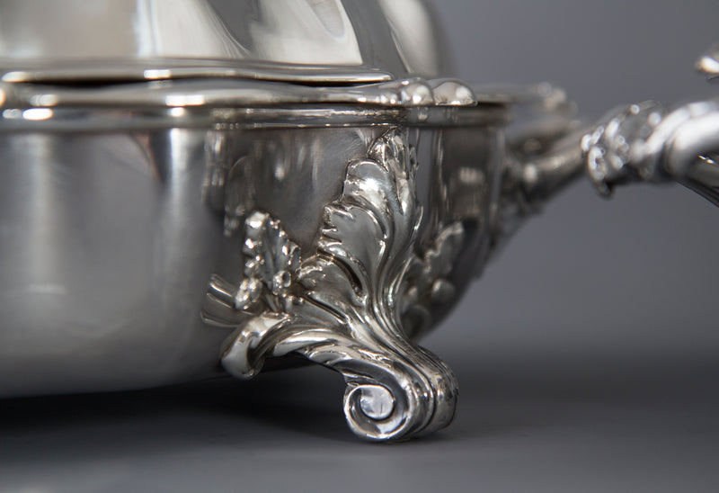 An Outstanding Pair of Silver Vegetable Tureens or Entree Dishes with Silver-Plated Warming Stands, by Joseph Angell & Son, London 1845