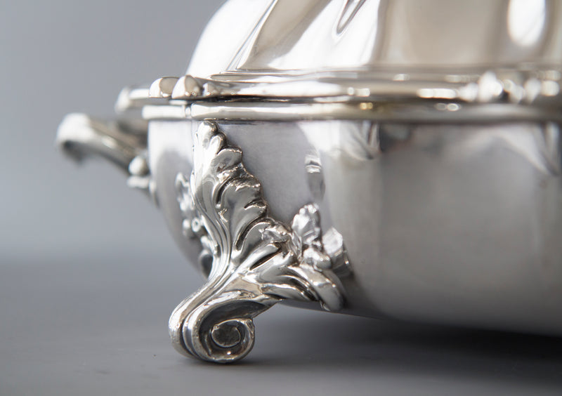 An Outstanding Pair of Silver Vegetable Tureens or Entree Dishes with Silver-Plated Warming Stands, by Joseph Angell & Son, London 1845